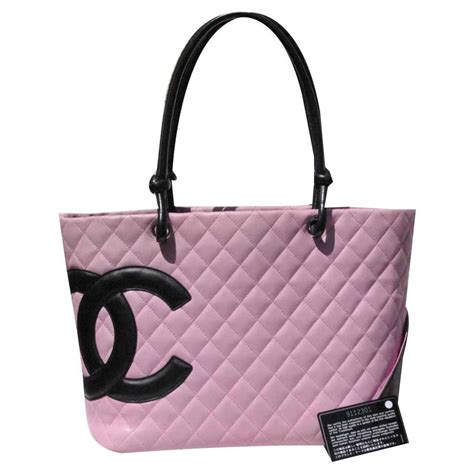 chanel pink and black handbag